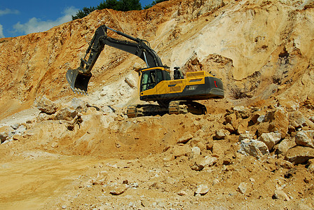 黄色搬运车地面推土机力量地球挖掘机建筑土壤工作装载机工程图片