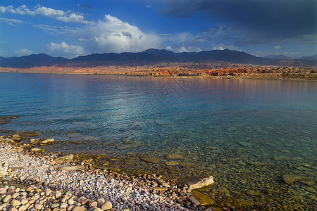 吉尔吉斯斯坦IssykKul湖旅行天空场景海滩国家支撑蓝色全景旅游海岸图片