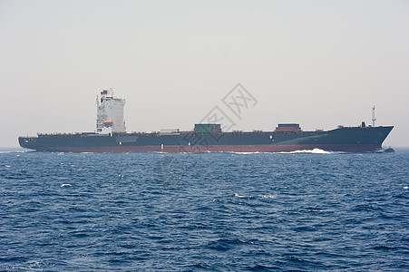 海上大型集装箱船舶上层建筑运输航海货物海洋运输车货船蓝色船体货运图片