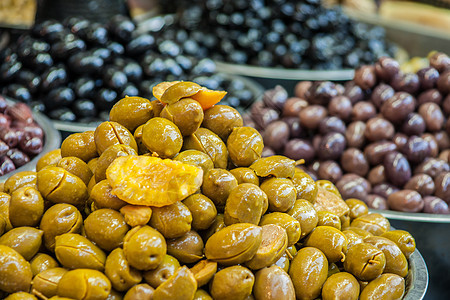 橄榄贸易团体市场棕色水果店铺摊位红色商品食物图片
