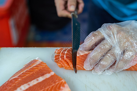 亚洲厨师切片 日食 生鱼肉橙子厨房木头饮食木板寿司服务海鲜自助餐美食图片