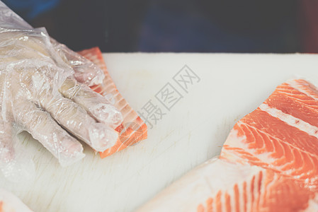 亚洲厨师切片 日食 生鱼肉美食餐厅橙子服务木板海鲜厨房寿司自助餐武士图片