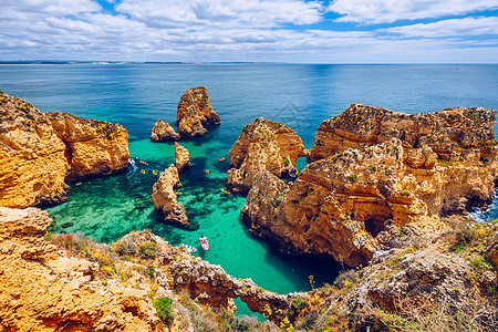 葡萄牙阿尔加韦拉各斯附近的海景地平线蓝色天空晴天海洋花斑海滨观光岩石图片
