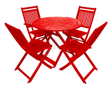 木制桌椅-红色背景图片