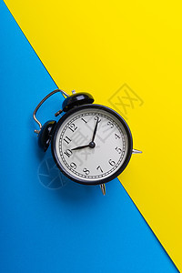 蓝色和黄色背景上的闹钟圆圈插图钟表倒数数字工作拨号手表午餐变更图片