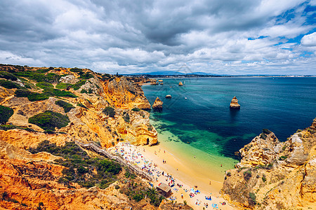 Camilo海滩 拉各斯 葡萄牙阿尔加夫海岸假期天桥支撑海岸线悬崖行人游客晴天海洋图片