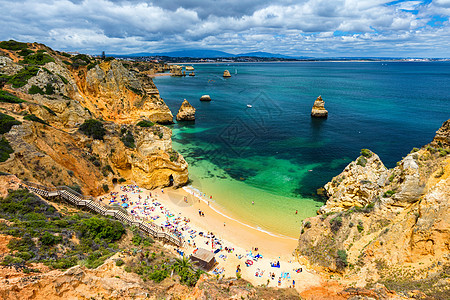 Camilo海滩 拉各斯 葡萄牙阿尔加夫悬崖岩石海景海岸线日落天桥行人天堂海岸游客图片