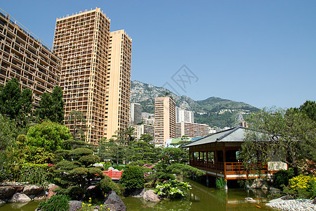 摩纳哥  日本花园摩天大楼建筑绿色城市全景地标岩石池塘衬套天空图片