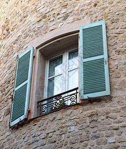 中世纪石墙上的窗口建筑学房子快门窗户百叶窗框架石头古董旅行建筑图片