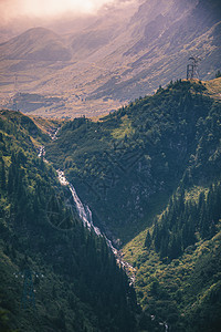 Fagaras山 Sibiu Romani等地的Balea瀑布森林溪流石头天空全景流动岩石蓝色峡谷天堂图片