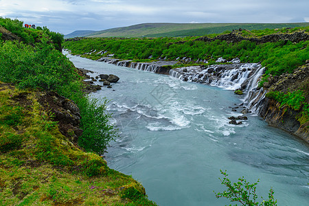 Hraunfossar瀑布美丽岩石流动旅行火山荒野维塔溪流绿色冰川图片