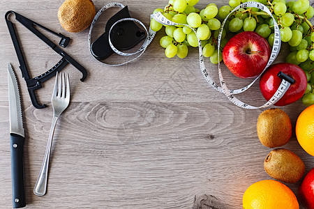 健康 健康和自然的水果种类繁多 有利于健康生活白色福利损失健身房测量橙子饮食活力早餐重量图片