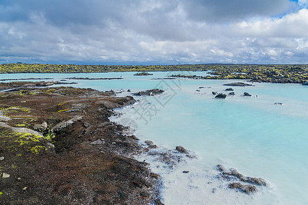 蓝环岩石沐浴者水池治疗游客蒸汽火山皮肤蓝色地热图片