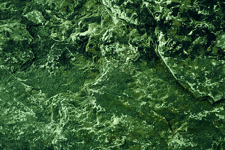 古老的深绿色苔藓花岗岩石表面的洞穴火山侵蚀大理石床单岩石石头艺术花岗岩矿物地面图片