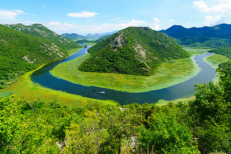 斯卡达尔湖绿色金字石国家公园山脉风景植物场景旅游曲线蓝色反射图片