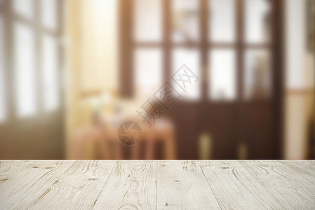 清空的木板桌 上面是咖啡馆或休息室模糊抽象摘要图片