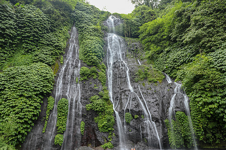 令人惊叹的班尤马拉瀑布 旅行巴厘岛森林游客环境石头岩石热带双胞胎溪流荒野秘密图片