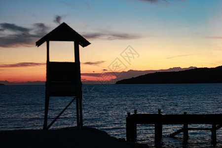 清晨黎明的暮光时刻旅游假期阳光海岸海滩海洋天空橙子反射日落图片