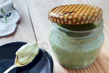 养蜂产品 在玻璃罐子里有蜂蜜的美酒养蜂人熊蜂昆虫桌子养蜂业蜂巢食物蜂房蜂窝图片