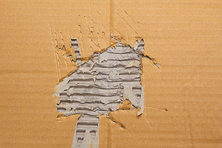 用于设计艺术作品的回收纸盒的撕破波纹棕色纸板抽象背景纹理包装涂层折痕卡片床单瓦楞皱纹废料材料数字图片