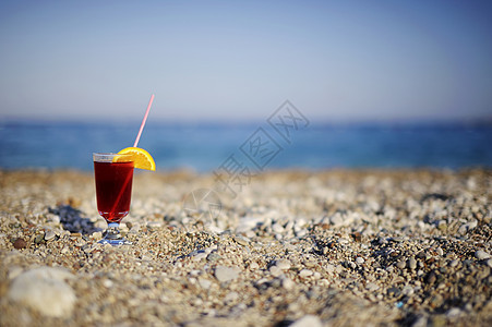 热带新鲜果汁在海滩上海洋海岸线果味假期橙子玻璃情调支撑派对异国图片
