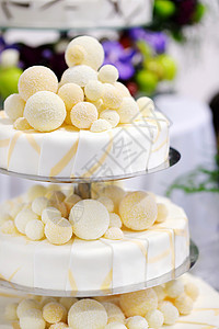 迷人的婚礼蛋糕风格婚姻接待妻子甜点丈夫面包派对装饰奶油图片