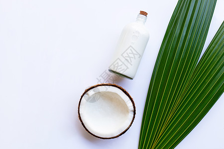 椰子圈加白的椰子奶棕榈面包营养甜点异国饮食圆圈可可小吃木头图片