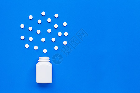 蓝色背景的帕拉塞塔摩醇平板药剂胶囊药丸诊所处方制药抗生素药店治疗止痛药图片