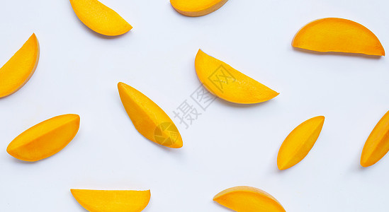 白色背景的芒果切片饮食热带叶子食物维生素蔬菜沙拉水果甜点营养图片