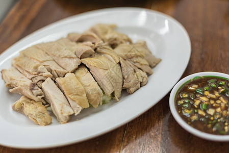 在街边食物中用鸡汤蒸饭的稻米蔬菜辣椒早餐午餐黄瓜盘子男人蒸汽文化美食图片