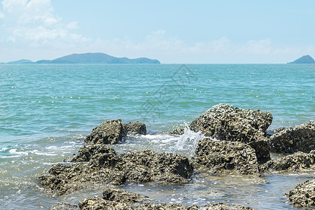 海滩和海洋景观 珊瑚礁岩石海滩海景热带石头美丽天空石灰石蓝色波浪晴天沿海图片