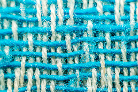 织物编织纹理表面的宏观羊毛服饰麻布服装抹布蓝色纤维亚麻纺织品帆布图片