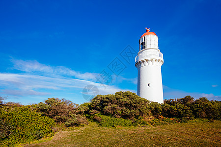 澳大利亚灯塔公司地标导航海岸线岩石博物馆海洋日落晴天海浪植物群图片