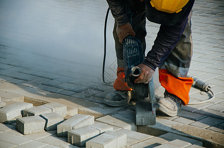 人行道建筑工街道建设者工作服务混凝土男人工人液体铺路建筑图片