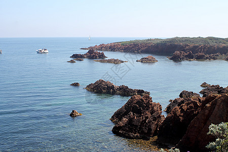 法兰西里维埃拉的埃斯特雷尔海岸岩石悬崖地块红色旅游风景海滩图片