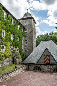 塞东施内伦堡城堡绿色参加者蓝色旅游历史石工建筑工厂天空堡垒背景图片