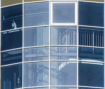 大学行政大楼的玻璃幕墙 o投资条纹窗户办公室建筑学总部建造蓝色立面框架图片