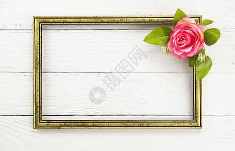金框和粉红色的玫瑰背景图片