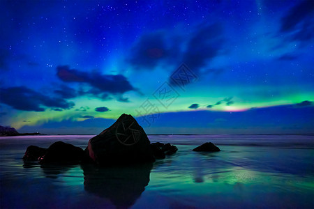 北极光 挪威洛福顿岛星星宇宙季节风景海滩极光天文学天空北极星峡湾图片