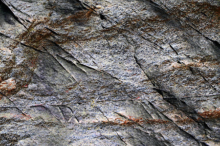 高分辨率花岗岩和石墙纹理的特写视图裂缝地面岩石大理石材料墙纸水泥艺术石头宏观图片