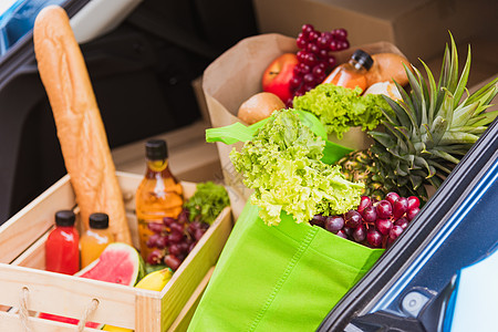 背着木篮子新鲜蔬菜的杂菜店服务导游瓶子食物店铺命令货车生态面包营养商业图片