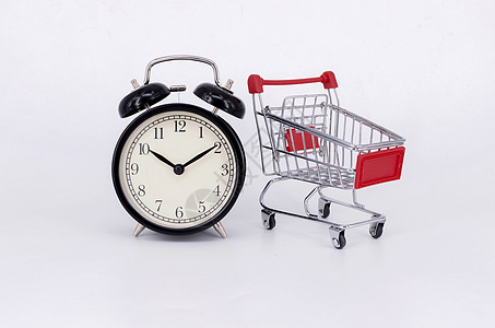 装有购物车的闹钟篮子办公室小时店铺销售大车市场金属时间手表图片