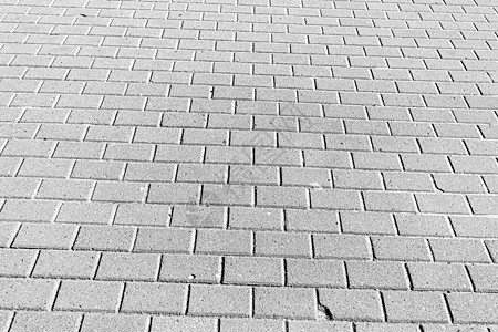 铺路石路的纹理 设计的抽象背景街道建筑学露台正方形城市花岗岩小路鹅卵石灰色人行道图片