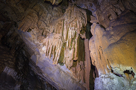 老挝蓝色旅游石头旅行洞穴天空环境地标地质学圣所图片