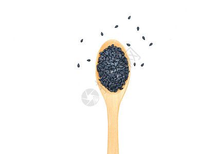 黑芝麻种子 在白色背景的木勺中草本植物食物营养黑色宏观香料谷物工作室调味品药品图片