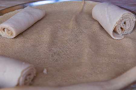 Injera 埃塞俄比亚的主食画眉食品盘子面粉美食食物面包饼子文化图片