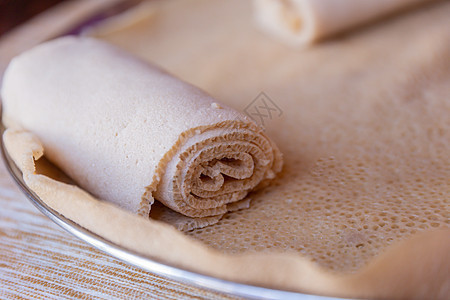 Injera 埃塞俄比亚的主食面包盘子食物面粉文化饼子美食画眉食品背景图片