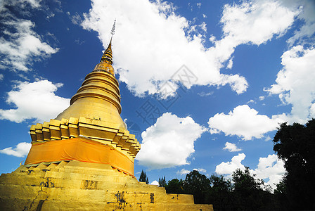 在泰国兰邦的Lampang合用电话圆顶金子雕像精神历史教会文化蓝色佛教徒艺术品图片