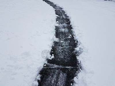 冬季有白雪铲铁铲的沥青车道沉淀寒冷小路街道白色天气图片