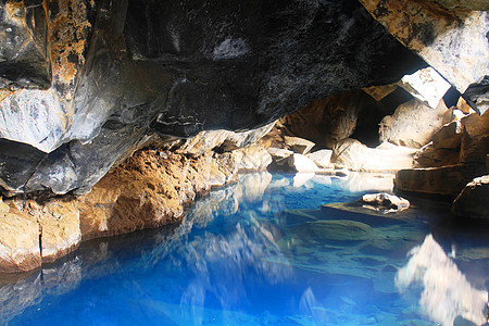 冰岛格若塔贾洞穴水池娱乐旅行游戏洞穴宝座蓝色岩石地热游泳图片